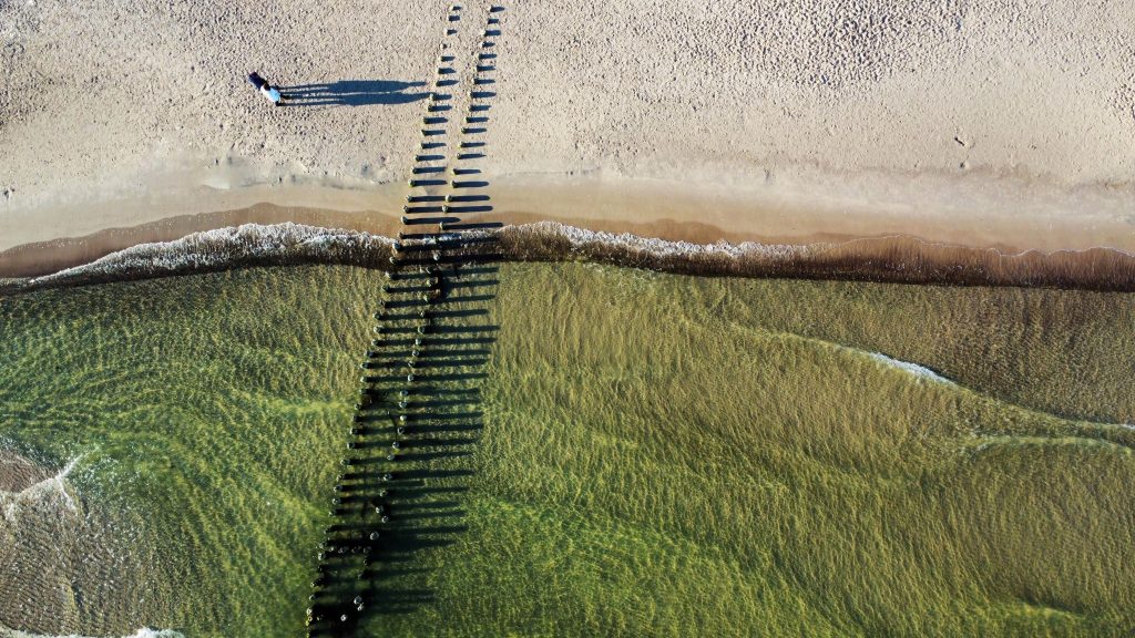 aerial shot walking on a beach 2022 06 11 01 14 37 utc 2 1